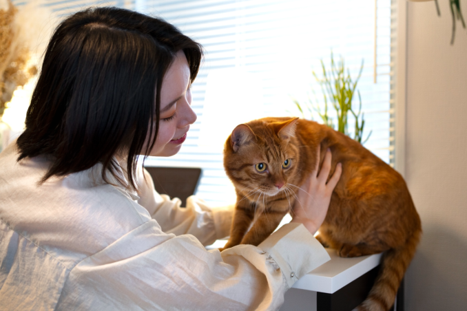 women holding cat